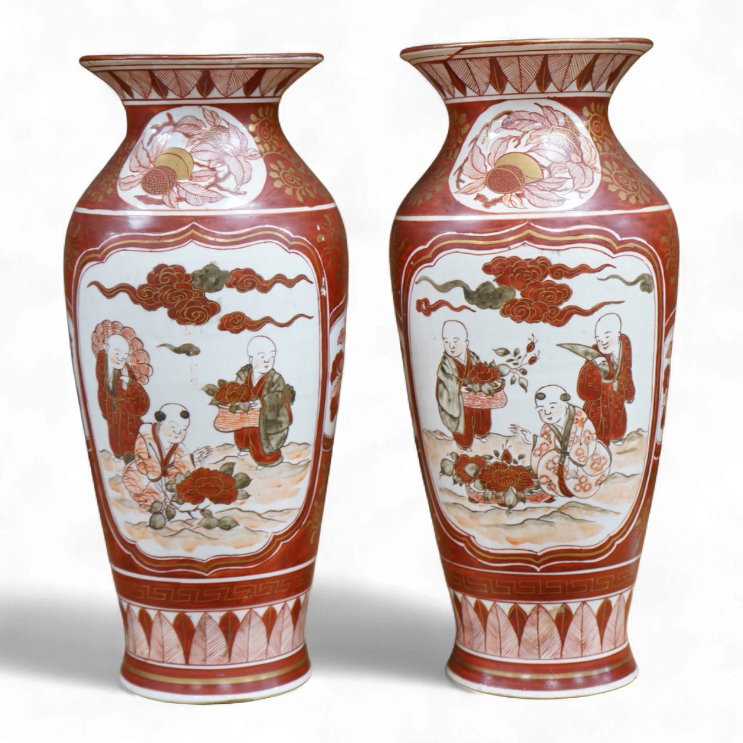 A pair of Japanese Kutani vases, signed, Meiji period (1868-1912), 25cm